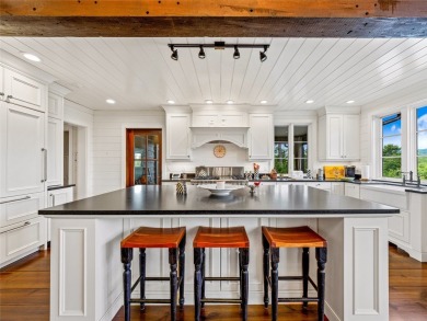 Classic in every sense of the word, this mountain chalet on Lake Toxaway Country Club in North Carolina - for sale on GolfHomes.com, golf home, golf lot