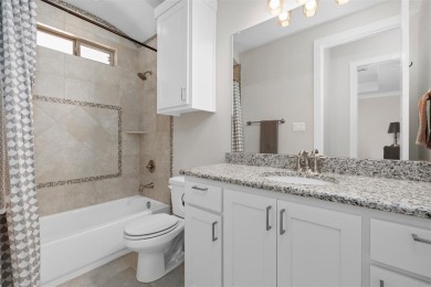 Discover your dream lifestyle with this pristine single-story on The Golf Club at Resort Eagle Mountain Lake in Texas - for sale on GolfHomes.com, golf home, golf lot