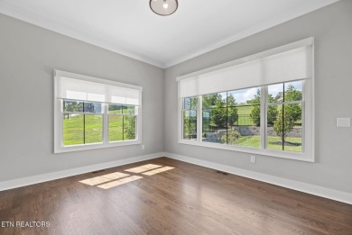 This craftsman style home features 4 bedrooms and 3.5 bathrooms on Tennessee National Golf Club in Tennessee - for sale on GolfHomes.com, golf home, golf lot