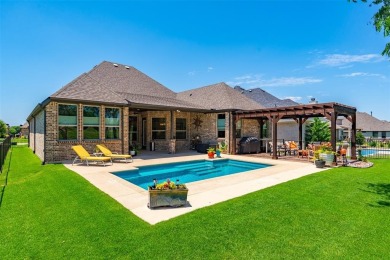Discover your dream lifestyle with this pristine single-story on The Golf Club at Resort Eagle Mountain Lake in Texas - for sale on GolfHomes.com, golf home, golf lot