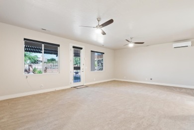 Enjoy life with virtually no power bill in this thoughtfully on Green Spring Country Club in Utah - for sale on GolfHomes.com, golf home, golf lot