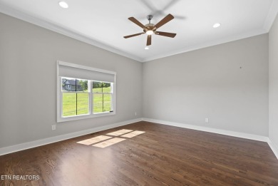 This craftsman style home features 4 bedrooms and 3.5 bathrooms on Tennessee National Golf Club in Tennessee - for sale on GolfHomes.com, golf home, golf lot