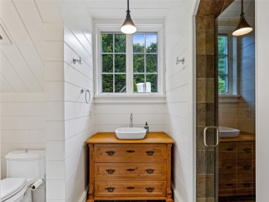 Classic in every sense of the word, this mountain chalet on Lake Toxaway Country Club in North Carolina - for sale on GolfHomes.com, golf home, golf lot