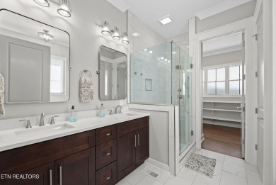 This craftsman style home features 4 bedrooms and 3.5 bathrooms on Tennessee National Golf Club in Tennessee - for sale on GolfHomes.com, golf home, golf lot