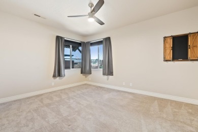 Enjoy life with virtually no power bill in this thoughtfully on Green Spring Country Club in Utah - for sale on GolfHomes.com, golf home, golf lot