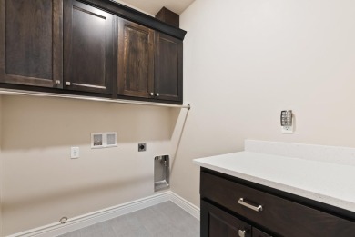 Enjoy life with virtually no power bill in this thoughtfully on Green Spring Country Club in Utah - for sale on GolfHomes.com, golf home, golf lot