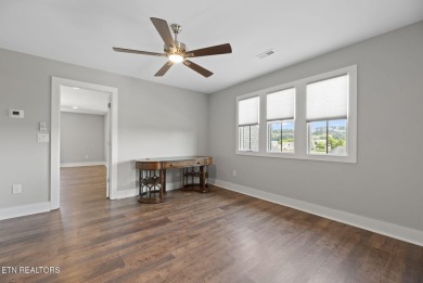 This craftsman style home features 4 bedrooms and 3.5 bathrooms on Tennessee National Golf Club in Tennessee - for sale on GolfHomes.com, golf home, golf lot