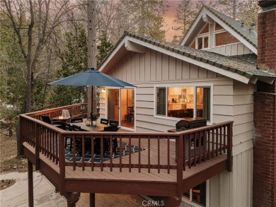 Escape to this stunning 4-bedroom, 3-bathroom mountain cabin on Lake Arrowhead Country Club in California - for sale on GolfHomes.com, golf home, golf lot