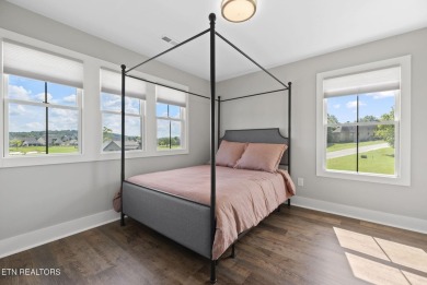 This craftsman style home features 4 bedrooms and 3.5 bathrooms on Tennessee National Golf Club in Tennessee - for sale on GolfHomes.com, golf home, golf lot