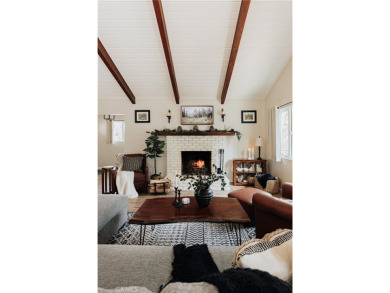 Escape to this stunning 4-bedroom, 3-bathroom mountain cabin on Lake Arrowhead Country Club in California - for sale on GolfHomes.com, golf home, golf lot