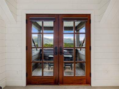 Classic in every sense of the word, this mountain chalet on Lake Toxaway Country Club in North Carolina - for sale on GolfHomes.com, golf home, golf lot