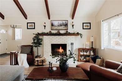 Escape to this stunning 4-bedroom, 3-bathroom mountain cabin on Lake Arrowhead Country Club in California - for sale on GolfHomes.com, golf home, golf lot