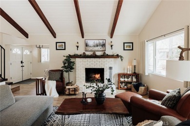 Escape to this stunning 4-bedroom, 3-bathroom mountain cabin on Lake Arrowhead Country Club in California - for sale on GolfHomes.com, golf home, golf lot