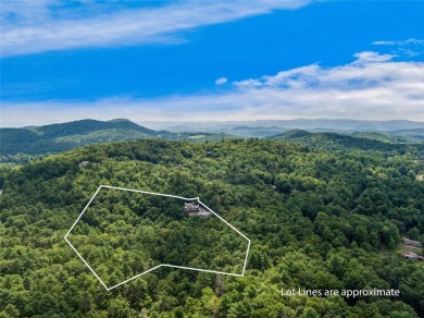 Classic in every sense of the word, this mountain chalet on Lake Toxaway Country Club in North Carolina - for sale on GolfHomes.com, golf home, golf lot