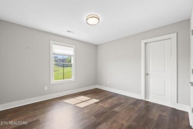 This craftsman style home features 4 bedrooms and 3.5 bathrooms on Tennessee National Golf Club in Tennessee - for sale on GolfHomes.com, golf home, golf lot