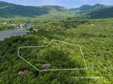 Classic in every sense of the word, this mountain chalet on Lake Toxaway Country Club in North Carolina - for sale on GolfHomes.com, golf home, golf lot