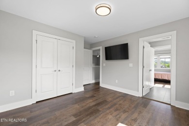 This craftsman style home features 4 bedrooms and 3.5 bathrooms on Tennessee National Golf Club in Tennessee - for sale on GolfHomes.com, golf home, golf lot