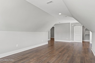 This craftsman style home features 4 bedrooms and 3.5 bathrooms on Tennessee National Golf Club in Tennessee - for sale on GolfHomes.com, golf home, golf lot