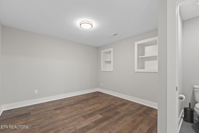 This craftsman style home features 4 bedrooms and 3.5 bathrooms on Tennessee National Golf Club in Tennessee - for sale on GolfHomes.com, golf home, golf lot