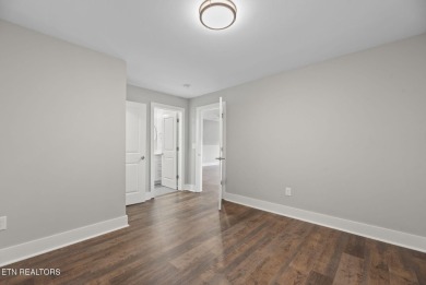 This craftsman style home features 4 bedrooms and 3.5 bathrooms on Tennessee National Golf Club in Tennessee - for sale on GolfHomes.com, golf home, golf lot