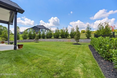 This craftsman style home features 4 bedrooms and 3.5 bathrooms on Tennessee National Golf Club in Tennessee - for sale on GolfHomes.com, golf home, golf lot