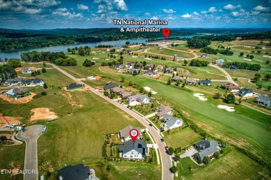 This craftsman style home features 4 bedrooms and 3.5 bathrooms on Tennessee National Golf Club in Tennessee - for sale on GolfHomes.com, golf home, golf lot