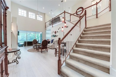 SPECTACULAR!! Beautifully and meticulously updated Kingfisher on Shadow Wood Country Club in Florida - for sale on GolfHomes.com, golf home, golf lot