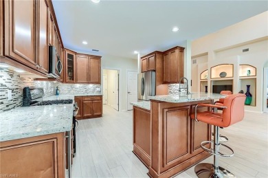 SPECTACULAR!! Beautifully and meticulously updated Kingfisher on Shadow Wood Country Club in Florida - for sale on GolfHomes.com, golf home, golf lot