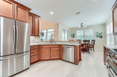 SPECTACULAR!! Beautifully and meticulously updated Kingfisher on Shadow Wood Country Club in Florida - for sale on GolfHomes.com, golf home, golf lot
