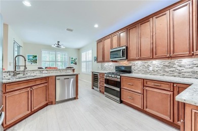 SPECTACULAR!! Beautifully and meticulously updated Kingfisher on Shadow Wood Country Club in Florida - for sale on GolfHomes.com, golf home, golf lot