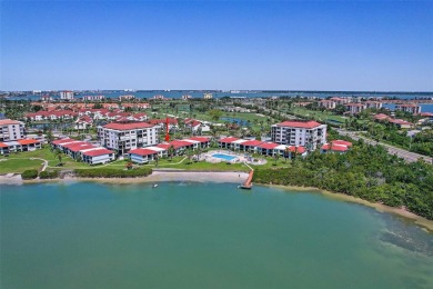 Beautiful water views abound from this 2nd floor villa in the on Isla Del Sol Yacht and Country Club in Florida - for sale on GolfHomes.com, golf home, golf lot