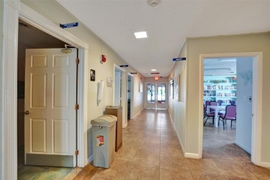 HANDYMAN SPECIAL!!! This property has evidence of moldmunity on Oriole Golf and Tennis Club in Florida - for sale on GolfHomes.com, golf home, golf lot