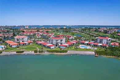 Beautiful water views abound from this 2nd floor villa in the on Isla Del Sol Yacht and Country Club in Florida - for sale on GolfHomes.com, golf home, golf lot