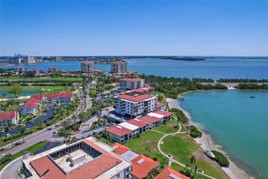 Beautiful water views abound from this 2nd floor villa in the on Isla Del Sol Yacht and Country Club in Florida - for sale on GolfHomes.com, golf home, golf lot