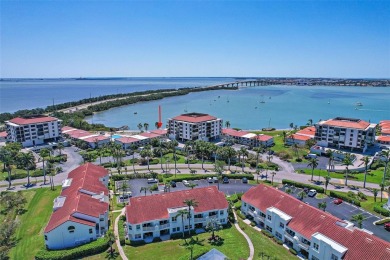 Beautiful water views abound from this 2nd floor villa in the on Isla Del Sol Yacht and Country Club in Florida - for sale on GolfHomes.com, golf home, golf lot