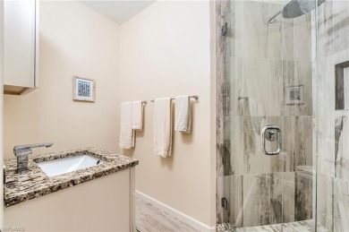 SPECTACULAR!! Beautifully and meticulously updated Kingfisher on Shadow Wood Country Club in Florida - for sale on GolfHomes.com, golf home, golf lot