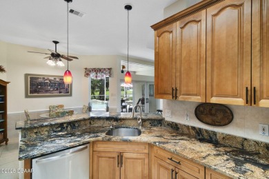 Located in the prestigious gated Spruce Creek Fly-In community on Spruce Creek Golf Club in Florida - for sale on GolfHomes.com, golf home, golf lot