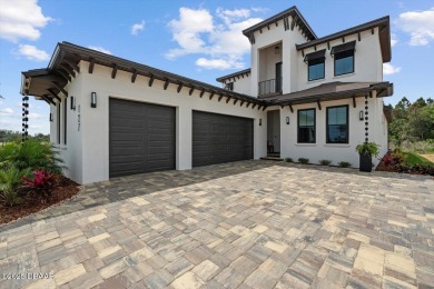 This stunning Hulbert Homes model in Veranda Bay isn't just on Ocean Palm Golf Course in Florida - for sale on GolfHomes.com, golf home, golf lot