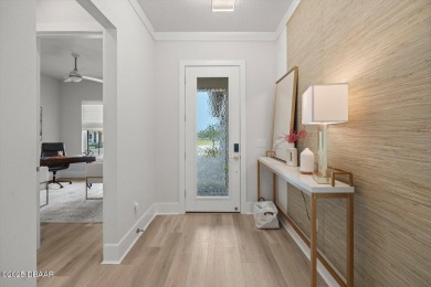 This stunning Hulbert Homes model in Veranda Bay isn't just on Ocean Palm Golf Course in Florida - for sale on GolfHomes.com, golf home, golf lot