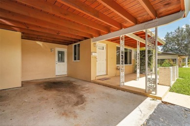 This charming 3-bedroom, 2-bathroom home offers the perfect on Fort Lauderdale Country Club in Florida - for sale on GolfHomes.com, golf home, golf lot