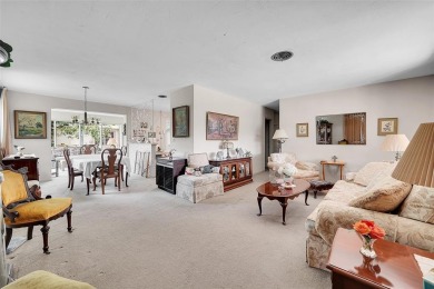 This charming 3-bedroom, 2-bathroom home offers the perfect on Fort Lauderdale Country Club in Florida - for sale on GolfHomes.com, golf home, golf lot