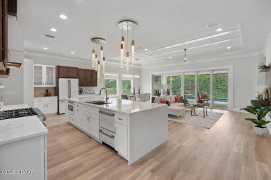 This stunning Hulbert Homes model in Veranda Bay isn't just on Ocean Palm Golf Course in Florida - for sale on GolfHomes.com, golf home, golf lot