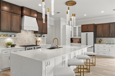 This stunning Hulbert Homes model in Veranda Bay isn't just on Ocean Palm Golf Course in Florida - for sale on GolfHomes.com, golf home, golf lot