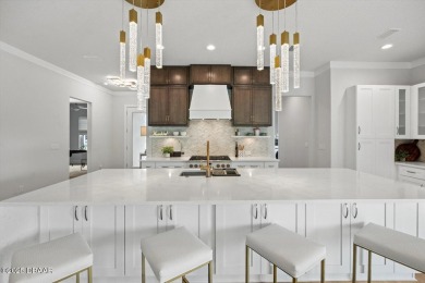 This stunning Hulbert Homes model in Veranda Bay isn't just on Ocean Palm Golf Course in Florida - for sale on GolfHomes.com, golf home, golf lot