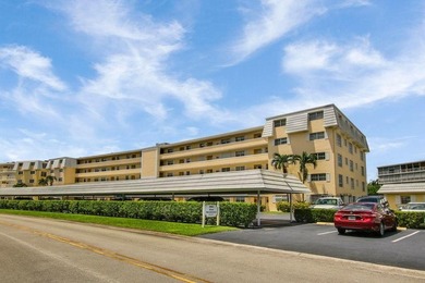 Very desirable bottom floor condo with views of the water, golf on Atlantis Golf Club in Florida - for sale on GolfHomes.com, golf home, golf lot