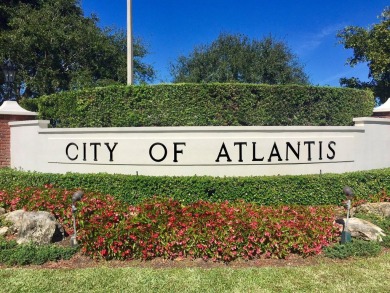 Very desirable bottom floor condo with views of the water, golf on Atlantis Golf Club in Florida - for sale on GolfHomes.com, golf home, golf lot