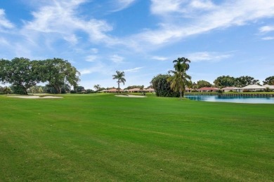 Very desirable bottom floor condo with views of the water, golf on Atlantis Golf Club in Florida - for sale on GolfHomes.com, golf home, golf lot