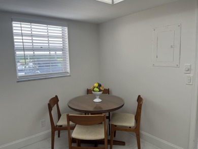 Very desirable bottom floor condo with views of the water, golf on Atlantis Golf Club in Florida - for sale on GolfHomes.com, golf home, golf lot