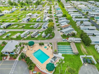 Check out this well-maintained 3-bedroom, 2-bathroom on Twin Isles Country Club in Florida - for sale on GolfHomes.com, golf home, golf lot