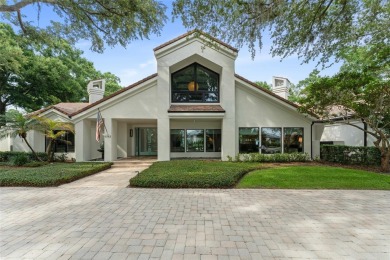 Nestled at the end of a quiet cul-de-sac on 1.15 acres within on Isleworth Golf and Country Club in Florida - for sale on GolfHomes.com, golf home, golf lot